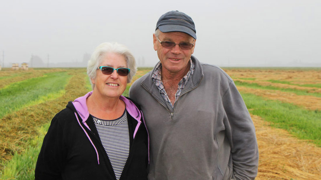 A two person in a farm field