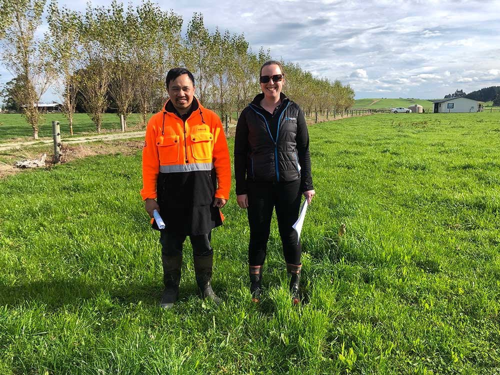 Contract milker Freddie Bajo with Fortuna Environment Manager Rosie Hunter