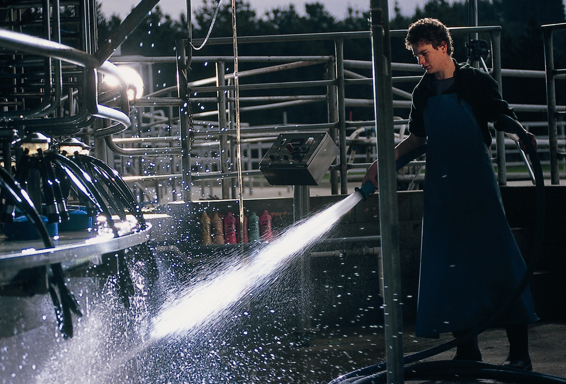 An image of a person harvesting milk